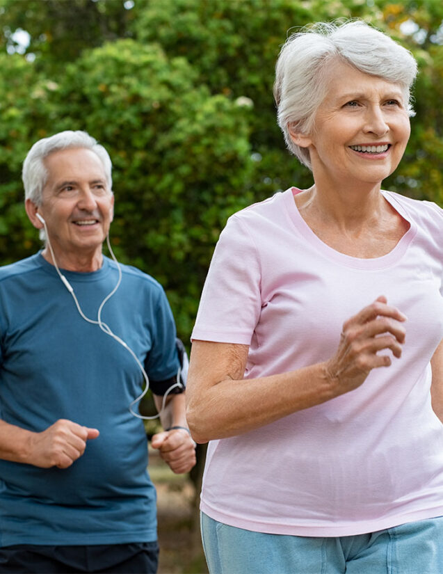older woman and man jogging